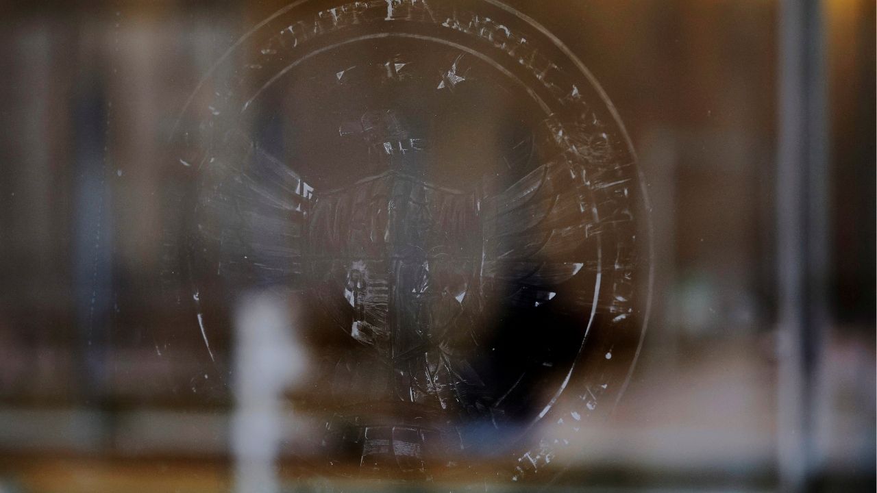 The name and logo for the Consumer Financial Protection Bureau (CFPB) is seen scraped off the door of its building in Washington, D.C., U.S., February 20, 2025. (Reuters File)