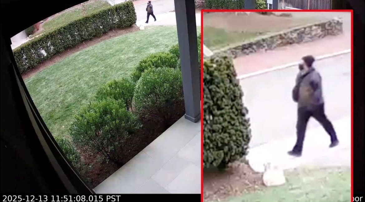 The person of interest in connection with the December 13, 2025 shooting at Brown University, in Providence, Rhode Island, U.S., walks in a screengrab from video released by the Providence Police. (Providence Police/via Reuters)
