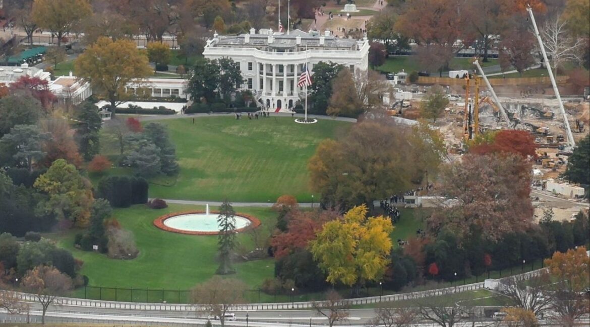 Tourists observe demolition of the East Wing of the White House during construction of U.S. President Donald Trump’s proposed ballroom from the top of the reopened Washington Monument, following the longest shutdown of the U.S. government in Washington, D.C., U.S., November 15, 2025. (Reuters/Jessica Koscielniak)