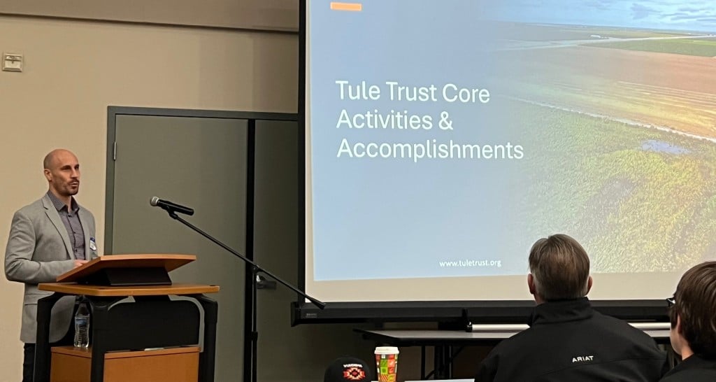 Image of Nick Reed-Krase executive director of the Tule Basin Land and Water Conservation Trust talking about projects at a Nov. 20 “State of the Tulare Basin” event.