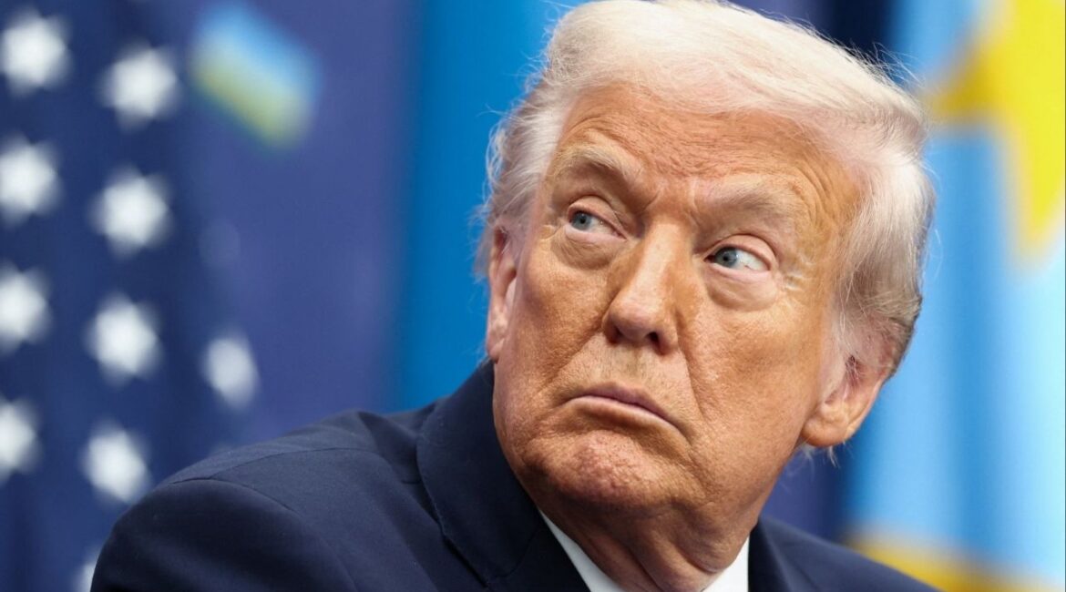 U.S. President Donald Trump looks on during a signing ceremony with President of the Democratic Republic of the Congo Felix Tshisekedi and President of Rwanda Paul Kagame (not pictured) at the U.S. Institute of Peace in Washington, D.C., U.S., December 4, 2025. (Reuters/Kevin Lamarque)