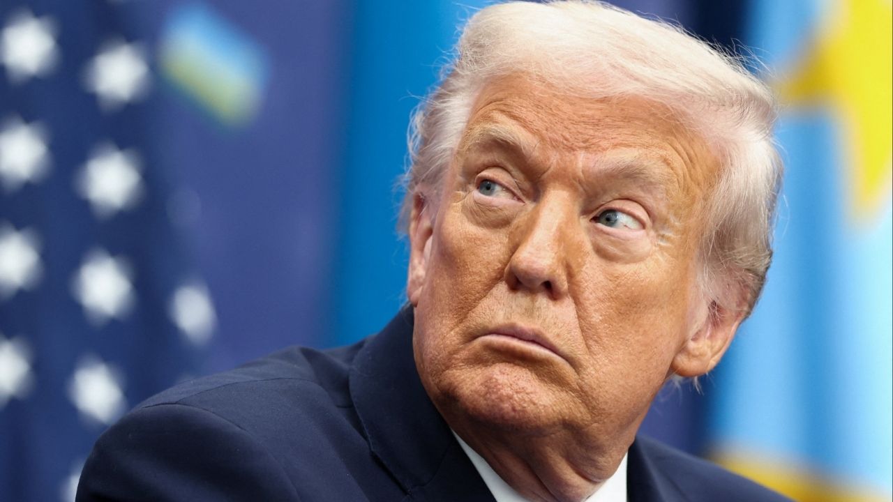 U.S. President Donald Trump looks on during a signing ceremony with President of the Democratic Republic of the Congo Felix Tshisekedi and President of Rwanda Paul Kagame (not pictured) at the U.S. Institute of Peace in Washington, D.C., U.S., December 4, 2025. (Reuters/Kevin Lamarque)