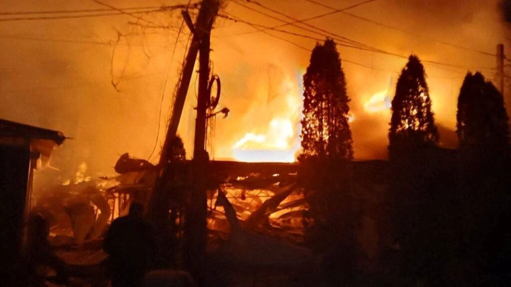 Image of fires burning in early morning after Ukrainian drone strike