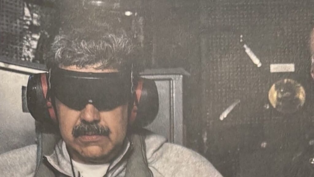 Image of A photograph which U.S. President Donald Trump posted on his Truth Social account shows what he describes as Venezuelan President "Nicolas Maduro on board the USS Iwo Jima" amphibious assault ship. He's wearing sunglasses and earphones