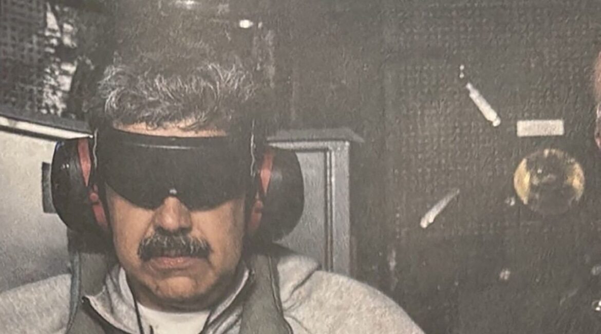 Image of A photograph which U.S. President Donald Trump posted on his Truth Social account shows what he describes as Venezuelan President "Nicolas Maduro on board the USS Iwo Jima" amphibious assault ship. He's wearing sunglasses and earphones