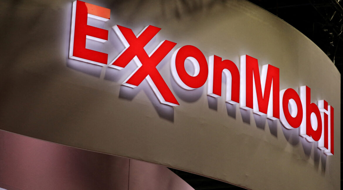 FILE PHOTO: The logo of American multinational oil and gas corporation ExxonMobil is seen during the LNG 2023 energy trade show in Vancouver, British Columbia, Canada, July 12, 2023. (Reuters/Chris Helgren/File Photo)