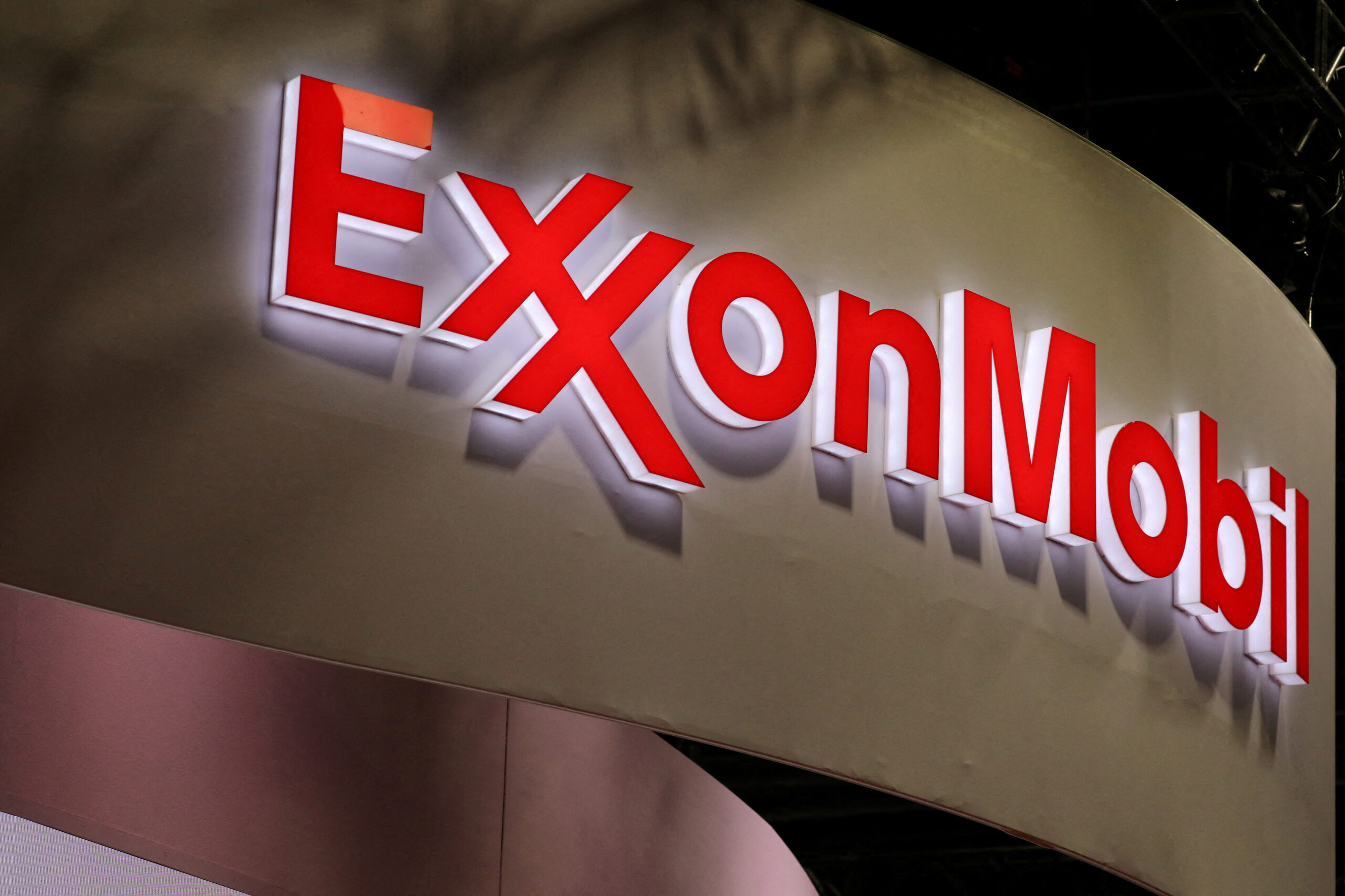 FILE PHOTO: The logo of American multinational oil and gas corporation ExxonMobil is seen during the LNG 2023 energy trade show in Vancouver, British Columbia, Canada, July 12, 2023. (Reuters/Chris Helgren/File Photo)
