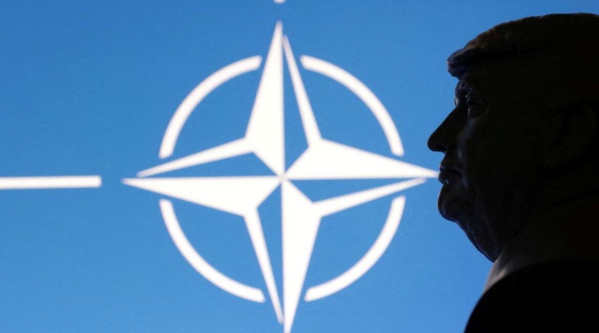 A 3D-printed miniature model of U.S. President Donald Trump with the NATO logo in the background is seen in this illustration taken April 23, 2025. (Reuters File)