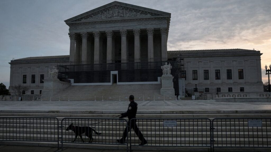 A U.S. Supreme Court Police canine unit patrols in front of the court building at the start of the day in Washington, D.C., U.S., January 9, 2026. (Reuters File)