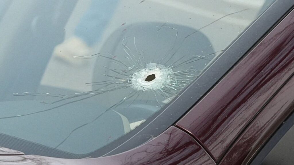A bullet hole in the windshield of a vehicle, after the fatal shooting of the driver Renee Nicole Good by a U.S. Immigration and Customs Enforcement (ICE) agent, in Minneapolis, Minnesota, U.S., January 7, 2026. (Reuters/Tim Evans)