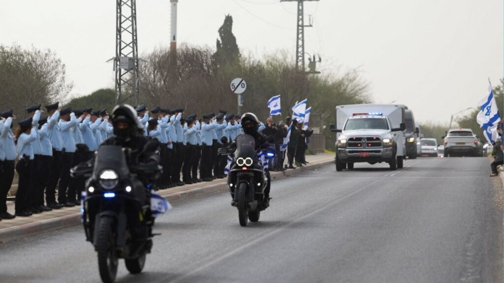 A convoy carrying the remains of the last hostage to be retrieved from Gaza, Ran Gvili, an off-duty police officer who was killed fighting militants that had infiltrated Israel during the deadly October 7, 2023, attack by Hamas, makes its way to his funeral, in Ramla, Israel, January 28, 2026. (Reuters/Nir Elias)