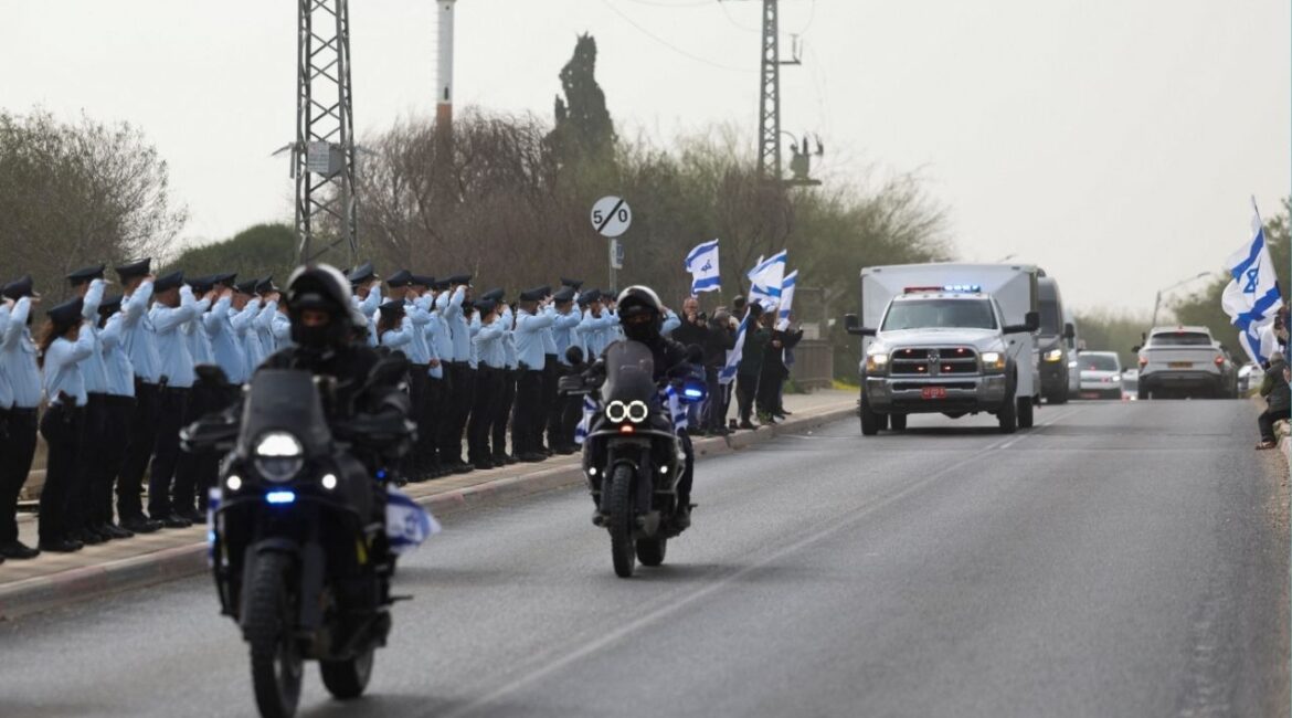 A convoy carrying the remains of the last hostage to be retrieved from Gaza, Ran Gvili, an off-duty police officer who was killed fighting militants that had infiltrated Israel during the deadly October 7, 2023, attack by Hamas, makes its way to his funeral, in Ramla, Israel, January 28, 2026. (Reuters/Nir Elias)