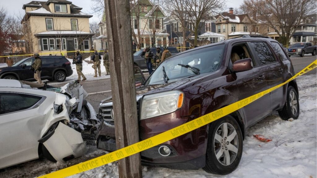 A crashed vehicle with a bullet hole in the front windshield and blood on the seat at the scene of a shooting involving a federal immigration officer in Minneapolis, on Wednesday, Jan. 7, 2026. A federal immigration officer shot and killed a person in Minneapolis on Wednesday during an enforcement operation, the Department of Homeland Security said. (David Guttenfelder/The New York Times)