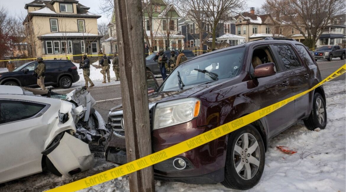 A crashed vehicle with a bullet hole in the front windshield and blood on the seat at the scene of a shooting involving a federal immigration officer in Minneapolis, on Wednesday, Jan. 7, 2026. A federal immigration officer shot and killed a person in Minneapolis on Wednesday during an enforcement operation, the Department of Homeland Security said. (David Guttenfelder/The New York Times)