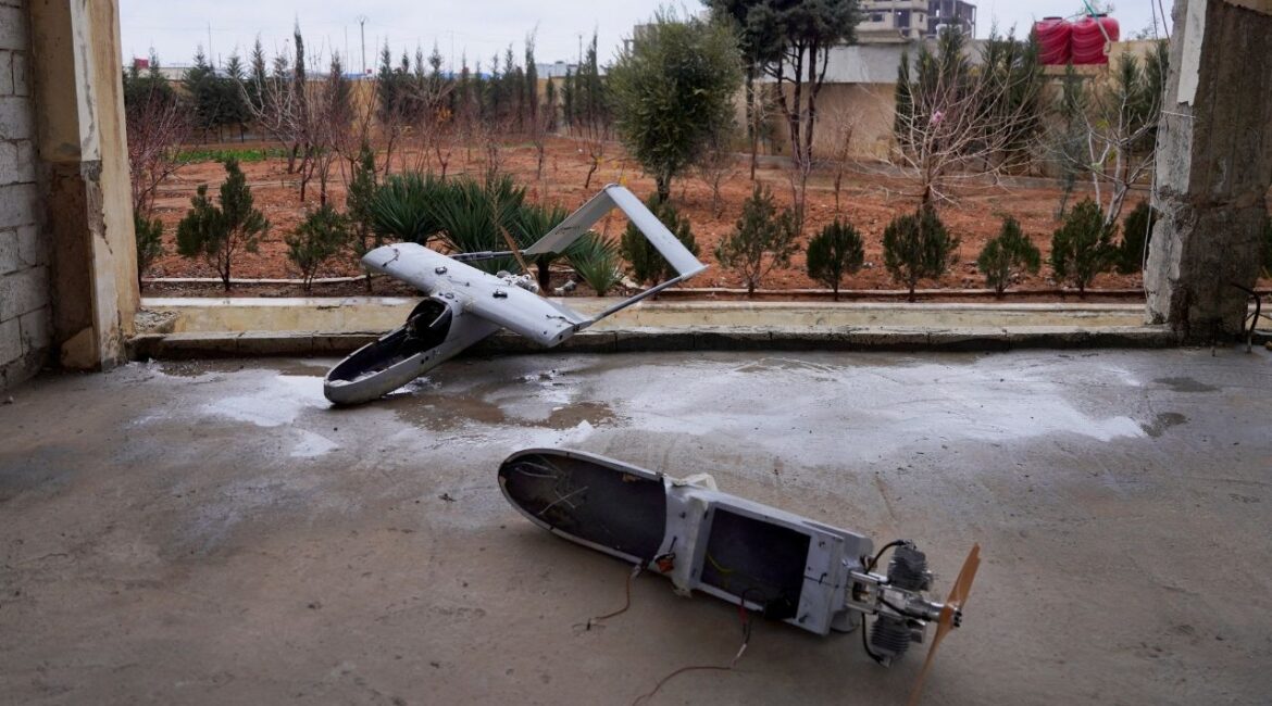 A damaged drone, which the Syrian army says belonged to SDF, lies on the ground, after Syria and the main Kurdish fighting force SDF struck a wide-ranging deal to bring Kurdish civilian and military authorities under central government control on Sunday, ending days of fighting in which Syrian troops captured territory including key oil fields, in Tabqa, Syria January 18, 2026. (Reuters/Karam al-Masri)