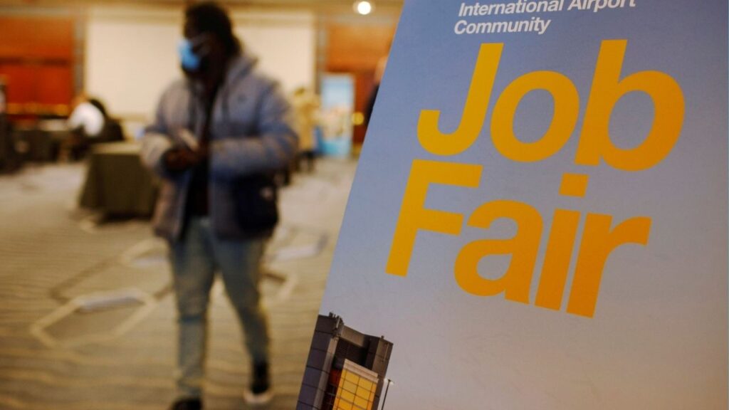 A job seeker leaves the job fair for airport related employment at Logan International Airport in Boston, Massachusetts, U.S., December 7, 2021. (Reuters/Brian Snyder)