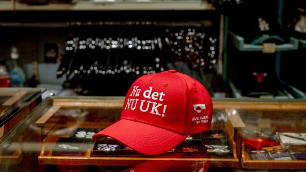 A red baseball cap reading “Make America Go Away” is displayed at McKorman, Jesper Tonnesen’s vintage clothing store in Copenhagen, Denmark, on Thursday, Jan. 15, 2026. The Danish writing on the hats, “Nu det Nuuk,” uses “Nuuk,” Greenland’s capital, to play on an expression that roughly means “enough is enough.” (Hilary Swift/The New York Times)