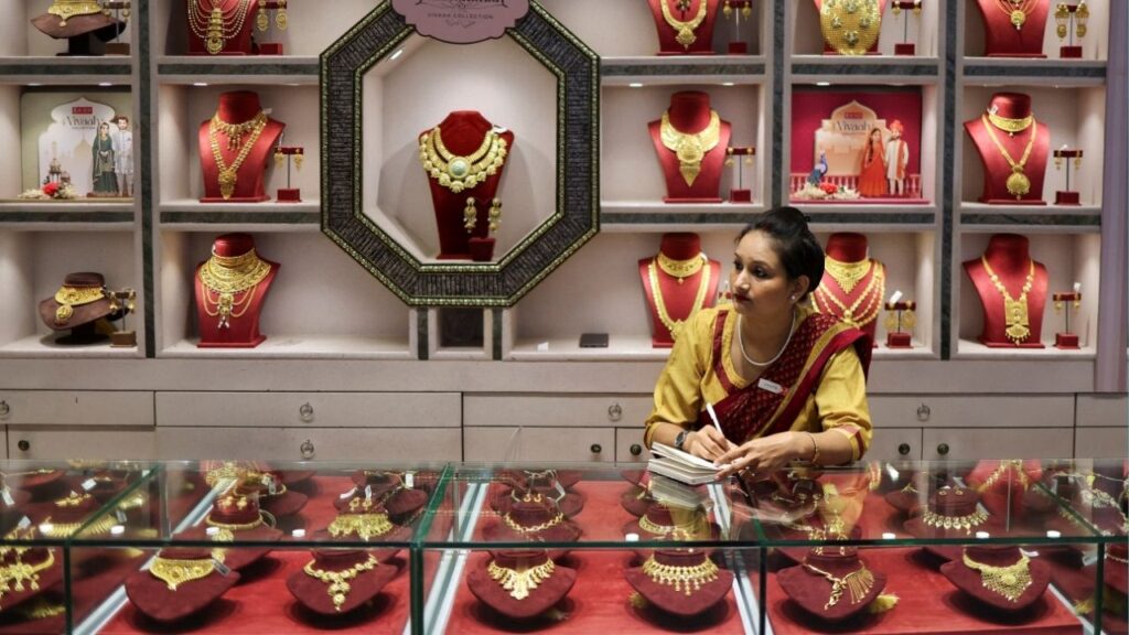A saleswoman sits inside a Senco Gold & Diamonds jewellery showroom in Kolkata, India, January 28, 2026. (Reuters/Sahiba Chawdhary)