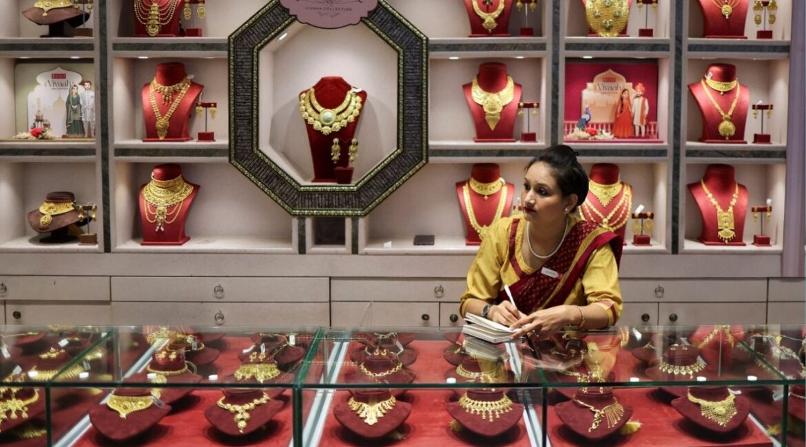 A saleswoman sits inside a Senco Gold & Diamonds jewellery showroom in Kolkata, India, January 28, 2026. (Reuters/Sahiba Chawdhary)