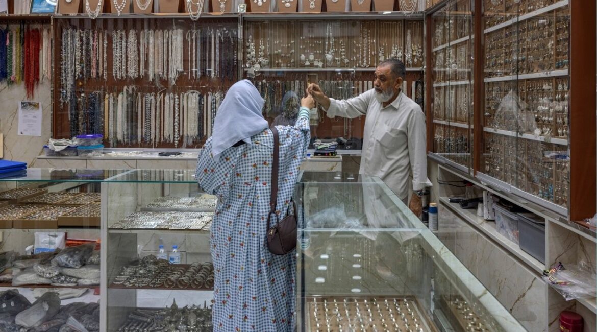 A silver merchant in Muscat, Oman, on Jan. 9 2026. Silver has been on a breakneck rally for much of the past year, more than doubling in price in 2025 before accelerating in the first few weeks of this year. (Katarina Premfors/The New York Times)