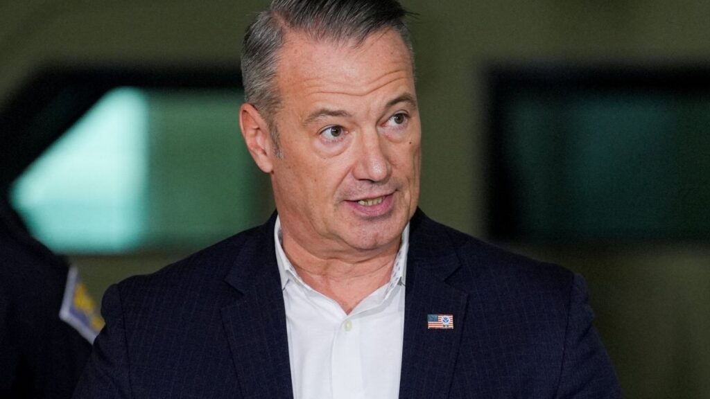 Acting Immigration and Customs Enforcement (ICE) director Todd Lyons speaks during a press conference about 'Operation Midway Blitz', an immigration enforcement campaign, from a hangar in Gary, Indiana, U.S., October 30, 2025. (Reuters/Leah Millis)