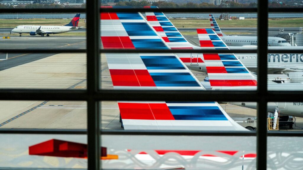 American Airlines flights stage at Ronald Reagan Washington National Airport as the Trump administration warns of impending cuts to commercial airline operations more than a month into the continuing U.S. government shutdown in Arlington, Virginia, U.S., November 7, 2025. (Reuters/Nathan Howard)