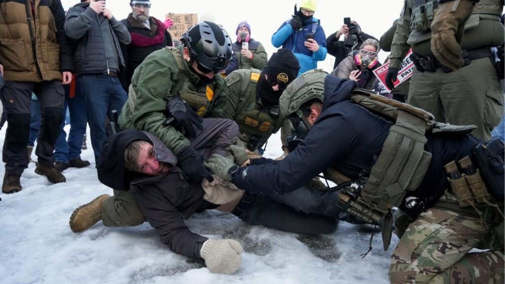 Border Patrol federal agents detain a demonstrator at a protest against the fatal shooting of Renee Nicole Good by a U.S. Immigration and Customs Enforcement (ICE) agent, during a rally against increased immigration enforcement across the city outside the Whipple Building in Minneapolis, Minnesota, U.S., January 8, 2026. (Reuters/Tim Evans TPX IMAGES OF THE DAY)