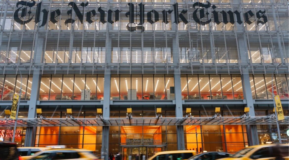 Cabs pass outside The New York Times building in Manhattan, Nov. 18, 2025. The Times has said restrictions imposed by the Pentagon in October 2025 infringe on the constitutional rights of journalists. (Lucia Vazquez/The New York Times)