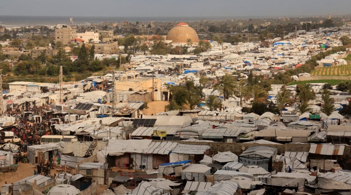 Displaced Palestinians shelter at a tent camp in Khan Younis, southern Gaza Strip, January 14, 2026. (Reuters/Haseeb Alwazeer)