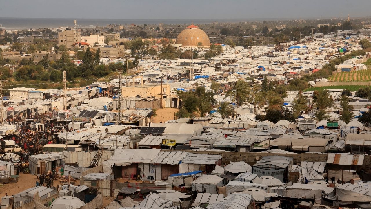 Displaced Palestinians shelter at a tent camp in Khan Younis, southern Gaza Strip, January 14, 2026. (Reuters/Haseeb Alwazeer)