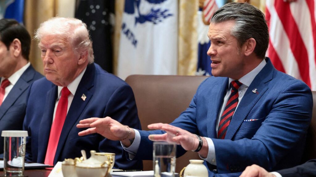 U.S. Defense Secretary Pete Hegseth speaks next to President Donald Trump during a cabinet meeting at the White House in Washington, D.C., U.S., January 29, 2026. (Reuters/Evelyn Hockstein/File Photo)