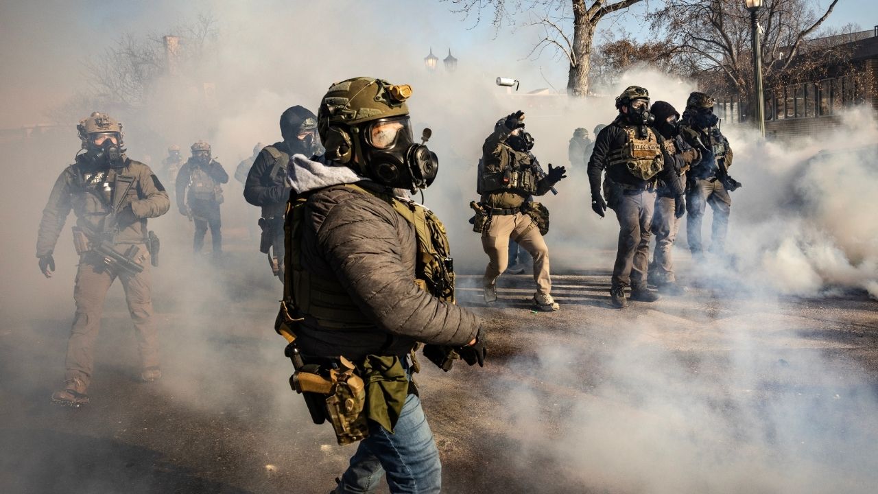 Federal agents deploy tear gas as they confront protestors in Minneapolis, near the site where federal agents shot and killed Alex Pretti on Saturday, Jan. 24, 2026. State and local officials say the federal deployment of immigration agents violates the 10th Amendment. (David Guttenfelder/The New York Times)