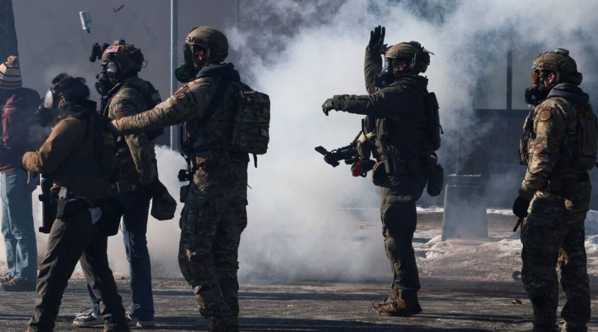 Federal agents use tear gas to disperse people gathered near the scene where federal agents fatally shot a man while trying to detain him, in Minneapolis, Minnesota, U.S., January 24, 2026. (Reuters/Evelyn Hockstein)