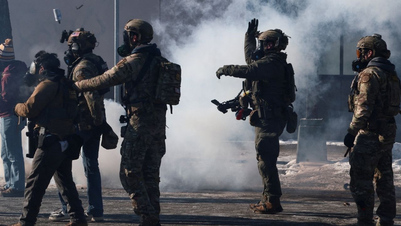 Federal agents use tear gas to disperse people gathered near the scene where federal agents fatally shot a man while trying to detain him, in Minneapolis, Minnesota, U.S., January 24, 2026. (Reuters/Evelyn Hockstein)