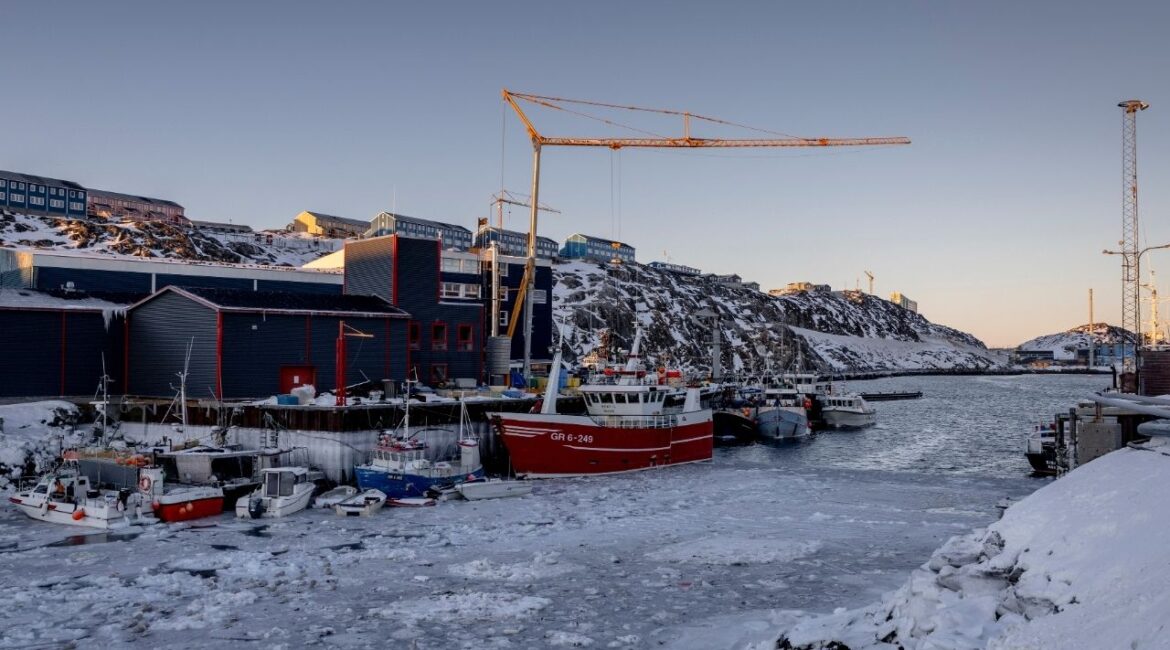 Fishing boats in a frozen harbor in Nuuk, Greenland, Jan. 13, 2025. The treaty that created NATO did not contemplate an attack by one ally on another. A seizure of Greenland by President Trump would test the endurance of the mutual-defense pact. (Ivor Prickett/The New York Times)