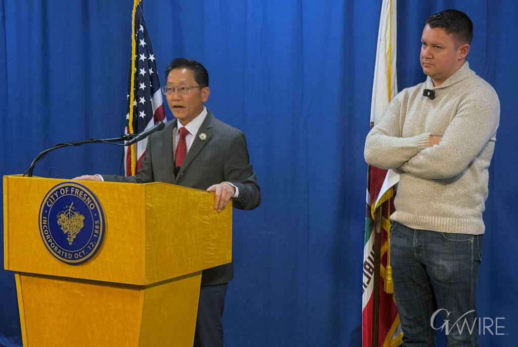 Fresno city councilmembers Brandon Vang and Nick Richardson hold a news conference at City Hall