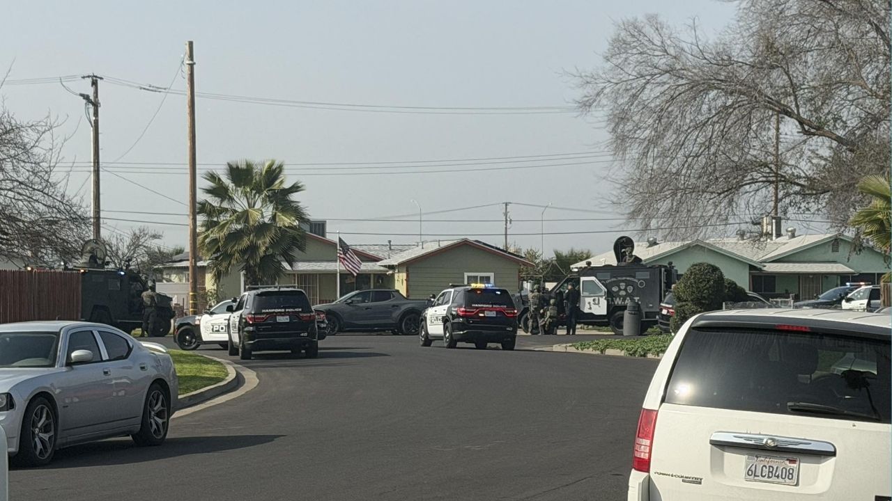 Hanford police and SWAT officers on Friday, Jan. 30, 2026, surrounded a home on Ogden Street after suspects shot and killed a 17-year-old at the Casa Del Sol Apartments earlier in the day. (City of Hanford)