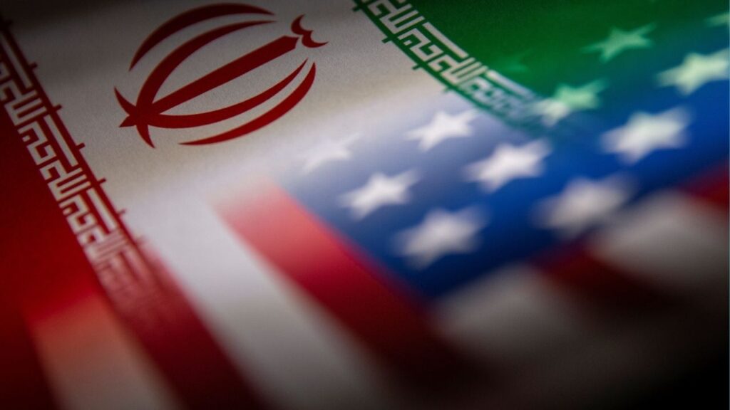 Iran's and U.S.' flags are seen printed on paper in this illustration taken January 27, 2022. (Reuters/Dado Ruvic/Illustration)