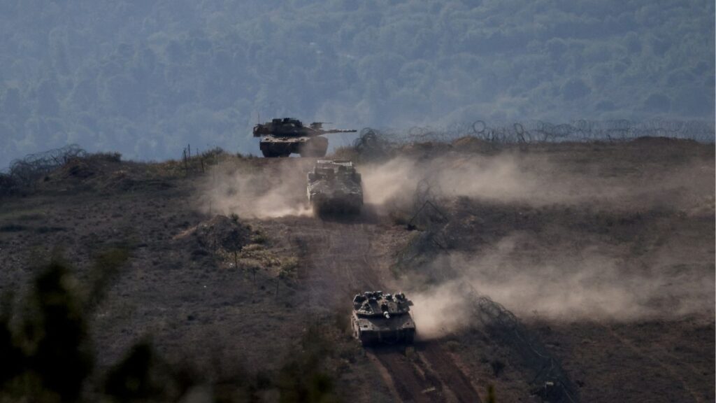 Lebanese army members stand on a military vehicle during a Lebanese army media tour, to review the army's operations in the southern Litani sector, in Alma Al-Shaab, near the border with Israel, southern Lebanon, November 28, 2025. (Reuters File)