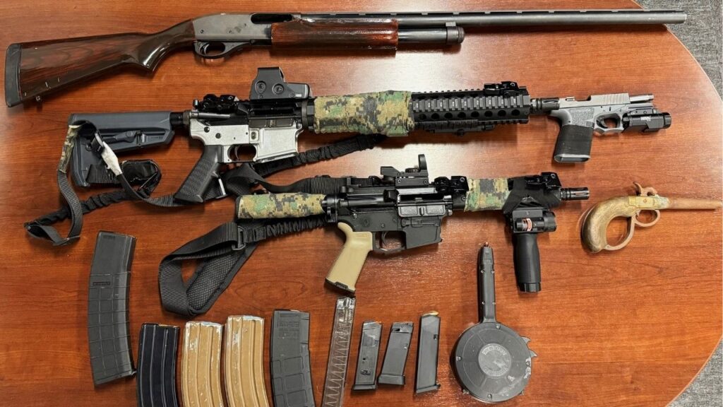 Madera police arrested Anthony Lopez, 28, and seized multiple firearms, including an assault rifle and an unregistered handgun, following a disturbance on Barnett Way where a gun was brandished. (Madera PD)