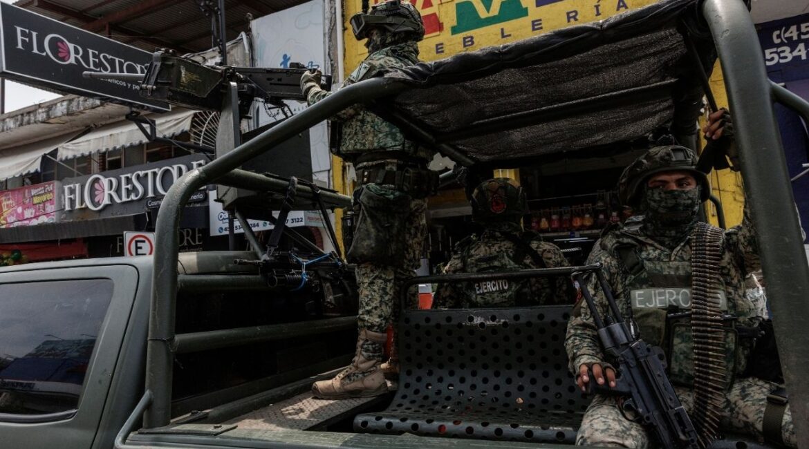 Members of the Mexican Army patrol the streets in Apatzingan, Mexico, on Aug. 13, 2025. The United States is escalating pressure on the Mexican government to permit the U.S. military to target fentanyl labs, according to American officials. (Adriana Zehbrauskas/The New York Times)