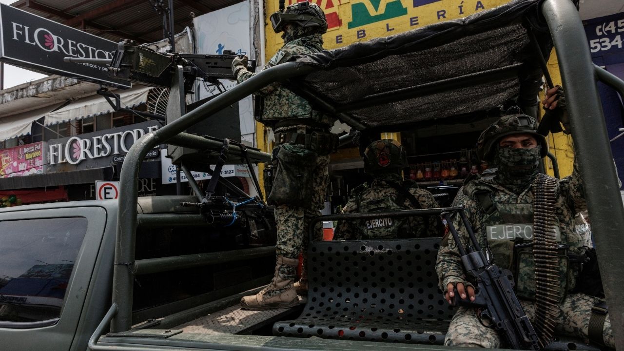 Members of the Mexican Army patrol the streets in Apatzingan, Mexico, on Aug. 13, 2025. The United States is escalating pressure on the Mexican government to permit the U.S. military to target fentanyl labs, according to American officials. (Adriana Zehbrauskas/The New York Times)