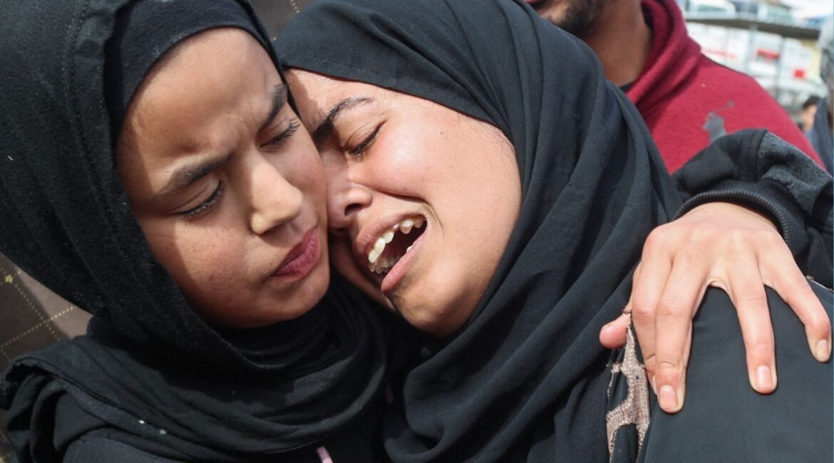 Mourners react during the funeral of Palestinians who, according to medics, were killed by Israeli gunfire on Thursday, at Nasser Hospital in Khan Younis, in the southern Gaza Strip, January 29, 2026. (Reuters/Ramadan Abed)