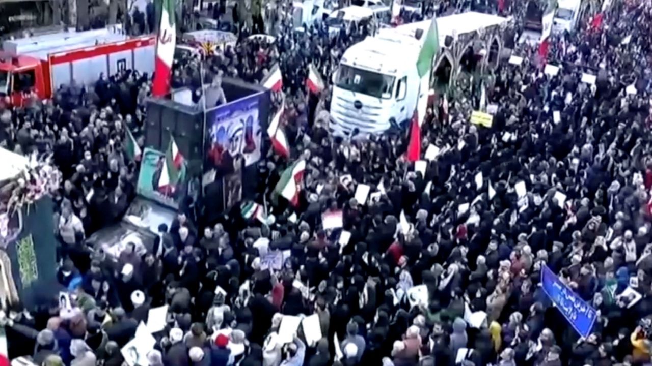 People attend a funeral procession, held by the Iranian government, for those said to be killed in recent protests, in Tehran, Iran, in this still image taken from a video released on January 14, 2026. IRAN PRESS/Handout via REUTERS