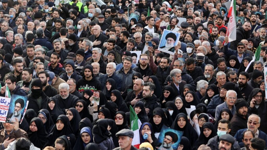 People attend the funeral of the security forces who were killed in the protests that erupted over the collapse of the currency's value in Tehran, Iran, January 14, 2026. Majid Asgaripour/WANA (West Asia News Agency) via REUTERS