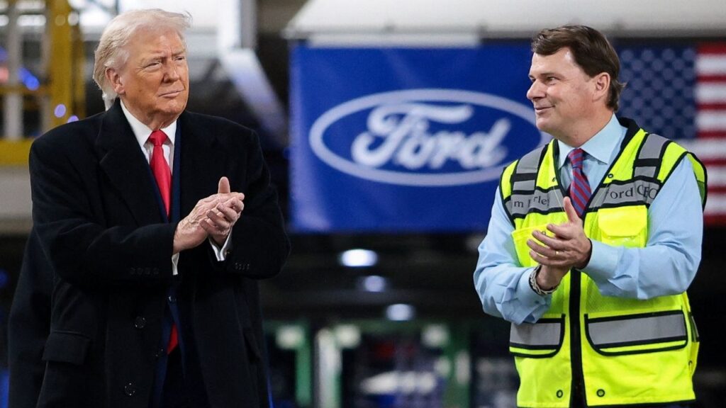 President Donald Trump and CEO of Ford Jim Farley clap, as President Trump visits a Ford production center, in Dearborn, Michigan, U.S., January 13, 2026. (Reuters/Evelyn Hockstein)