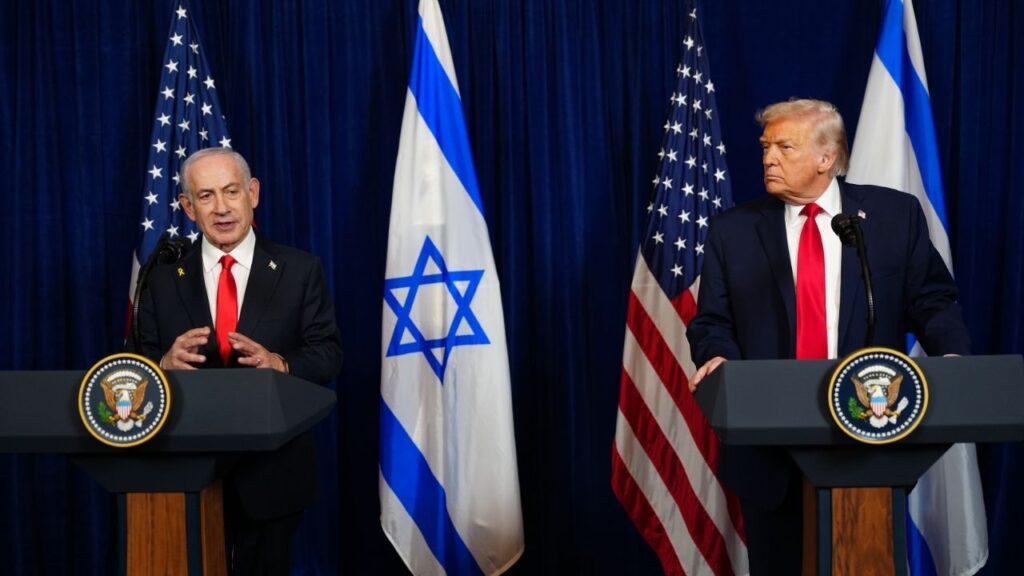 President Donald Trump, right, looks on as Prime Minister Benjamin Netanyahu of Israel speaks during a joint press conference at Mar-a-Lago in Palm Beach, Fla., Dec. 29, 2025. Netanyahu of Israel has asked Trump to postpone any plans for an American military attack on Iran, a senior U.S. official said on Thursday, Jan. 15, 2026, even as the Iranian government continues to grapple with nationwide protests. (Tierney L. Cross/The New York Times)
