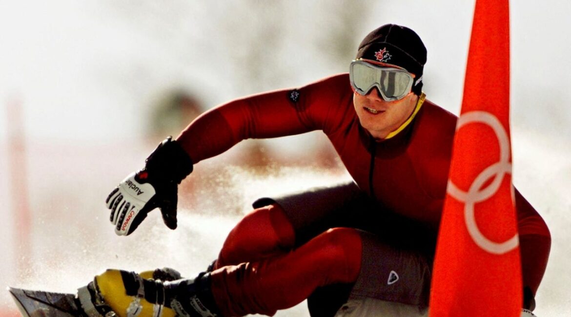Ryan Wedding of Canada takes a practice run for the men's parallel giant slalom of the Salt Lake 2002 Winter Olympic Games in Park City, February 13, 2002. Competition in the men's parallel giant slalom begins February 14, 2002. (Reuters File)