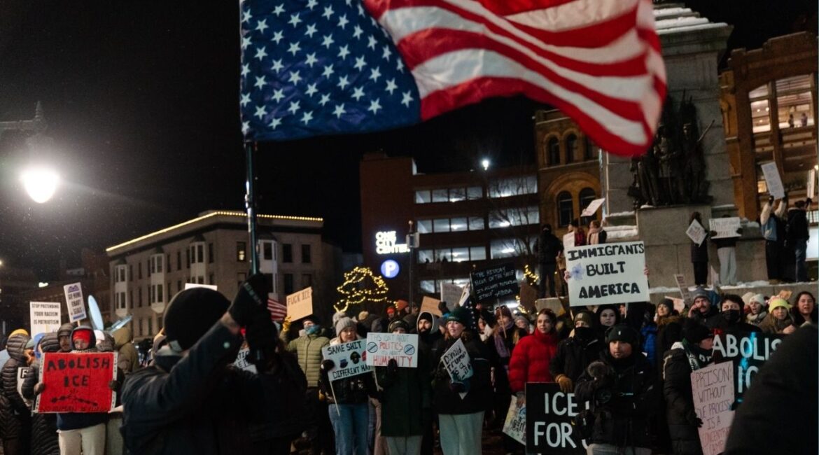 Some of the hundreds at a protest of the actions of Immigration and Customs Enforcement (ICE) agents at Monument Square spill onto an adjacent street in Portland, Maine, Jan. 23, 2026. A federal immigration crackdown has started in the state, with Department of Homeland Security officials saying that it’s targeting 1,400 “criminal illegal aliens who have terrorized communities.” (Sophie Park/The New York Times)