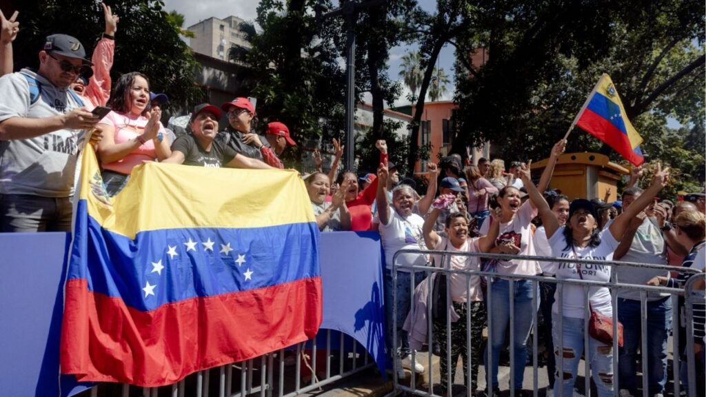 Supporters of Nicolas Maduro, the ousted president of Venezuela, await the start of a pro-government march in Caracas on Monday, Jan. 5, 2026. Days after President Donald Trump said the United States would “run” Venezuela, the sprawling political, security and intelligence apparatus that propped up Maduro’s strongman rule is in still place, and day-to-day life for many Venezuelans has worsened. (The New York Times)